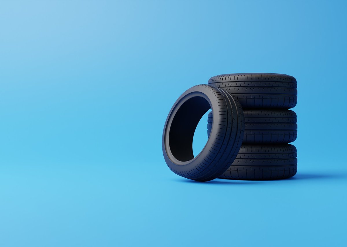 Stack of car tires ready for seasonal changeover