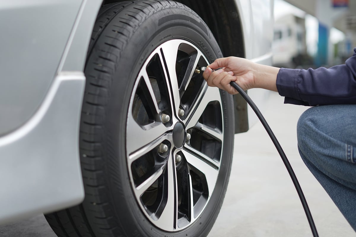Inflating car tires before a trip